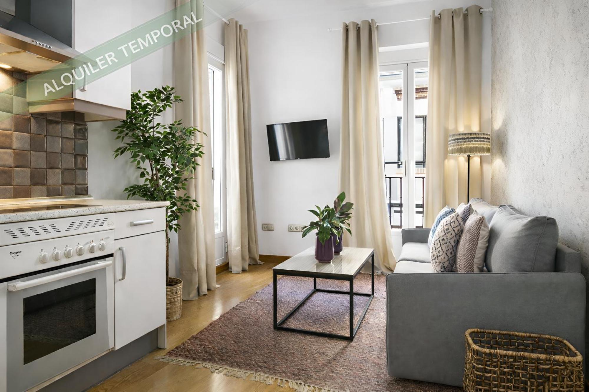 Suites Familiares Gran Via — Fotos 1